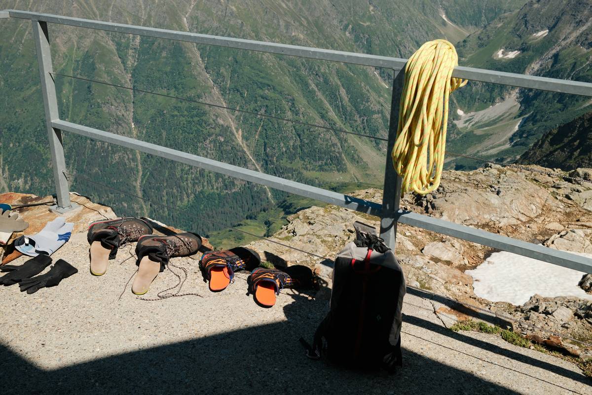 Climber wearing a certified helmet with visible UIAA label, illustrating climbing helmet safety standards in action